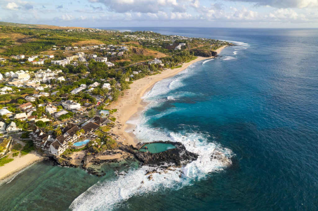 An aerial view of Boucan-Canot beach in the west of Reunion Island on a sunny day